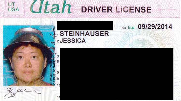 Strainer as a hat in a license photo 